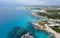 Aerial drone view of the coastline of empty beach in winter. Summer holidays. Nissi beach Ayia Napa, Cyprus