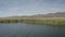 Aerial Drone View of Colorado river close to Parker Dam on a bright sunny day showing Arizona and California