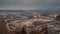 Aerial drone view of construction site of new city blocks in the district of Koseze in Ljubljana, Slovenia. Wide panorama in cold