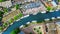 Aerial drone view of Delft town cityscape from above, typical Dutch city skyline with canals and houses, Netherlands