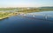 Aerial drone view of Dnepr river and Rybalskiy island from above, bridges and skyline of Kiev city, Ukraine