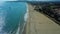 Aerial drone view drone is flying over beach upward waves. Top view