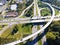 Aerial drone view of elevated road and traffic junctions. Transport highway. Modern construction design of traffic ways to avoid