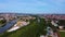 Aerial drone view of the fair Maidult in Regensburg, Bavaria, Germany with ferris wheel and beer tents on sunny day