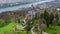 Aerial drone view fairy tale neogothic castle Drachenburg North Rhine Westphalia, Germany near Bonn in cloudy spring day