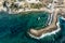 Aerial drone view of fishing boats moored at the harbor. moored at breakwater.