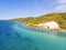 Aerial drone view of Fourka Skala sea and pine forest in Halkidiki, Greece