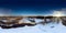 An aerial drone view of the frozen Jagala waterfall, Estonia at sunset 360 degrees panorama. Winter landscape.