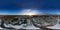 An aerial drone view of the frozen Jagala waterfall, Estonia at sunset 360 degrees panorama. Winter landscape.