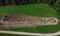 Aerial drone view of geothermal heating collector pit or trench in the ground. Excavation of ditch or holes for thermal heat