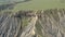 Aerial drone view green desert mountain plateau. Panorama steep rocky mountains