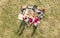 Aerial drone view of happy families having fun with kids at picnic