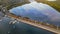 Aerial drone view of Hawkesbury River at Brooklyn, NSW Australia showing a train crossing Hawkesbury River