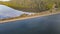 Aerial drone view of Hawkesbury River at Brooklyn, NSW Australia showing a train crossing Hawkesbury River