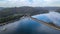 Aerial drone view of Hawkesbury River at Brooklyn, NSW Australia showing a train crossing Hawkesbury River