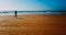 Aerial Drone View Of Healthy Sportive Woman Running On Beach