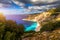 Aerial drone view of iconic turquoise and sapphire bay and beach of Myrtos, Kefalonia (Cephalonia) island, Ionian, Greece. Myrtos