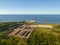 An aerial drone view of the industrial port in the Baltic Sea. Storage areas and tank fleet of the liquid chemicals terminal.