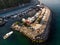 Aerial Drone View of Istanbul Uskudar Seaside with Boats Docked in Cove.