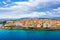 Aerial drone view of Kerkyra city with colorful houses during summer sunny day. Corfu island, Greece