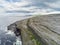 Aerial drone view, landscape in Burren region, county Clare  Ireland. Mini cliffs and Atlantic ocean,