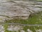 Aerial drone view, landscape in Burren region, county Clare Ireland. Small road between famous rock terrain