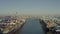 Aerial, drone view of large, intermodal ships docked in the port of Long Beach