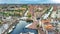 Aerial drone view of Leiden town cityscape from above, typical Dutch city skyline with canals and houses, Holland, Netherlands