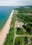 Aerial drone view of local houses near the coastline in Tanjung Jara, Dungun, Terengganu, Malaysia