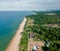 Aerial drone view of local houses near the coastline in Tanjung Jara, Dungun, Terengganu, Malaysia