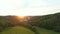 Aerial drone view of magic sunset over the Karlstejn castle, Czech republic. Famous castle is built on top of hill in the forest.