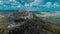 Aerial drone view of magnificent village of Motovun in Croatian Istria on a sunny day with cute fluffy clouds. Idyllic view of