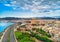 Aerial drone view Majorca cityscape, road along the coast of Mediterranean sea and famous Cathedral of Palma de Mallorca or Le Seu