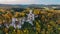 Aerial drone view medieval Lichtenstein castle on mountain, autumn Baden-Wurttemberg, Germany.