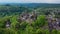 Aerial drone view medieval neo-gothic Braunfels castle on top of hill on gloomy rainy day. Hessen, Germany