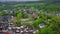 Aerial drone view medieval neo-gothic Braunfels castle on top of hill on gloomy rainy day. Hessen, Germany