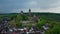 Aerial drone view medieval neo-gothic Braunfels castle on top of hill on gloomy rainy day. Hessen, Germany