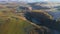 Aerial drone view of mining quarry, crushing machinery, processing plant for gravel