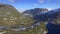 Aerial drone view mountain road by the lake in Norway.