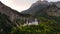 Aerial drone view Neuschwanstein castle on Alps background in vicinity of Munich, Bavaria, Germany, Europe. Autumn