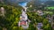 Aerial drone view Neuschwanstein castle on Alps background in vicinity of Munich, Bavaria, Germany, Europe. Autumn