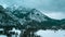 Aerial drone view Neuschwanstein castle on Alps background in vicinity of Munich, Bavaria, Germany, Europe. Winter