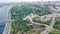 Aerial drone view of new pedestrian cycling park bridge construction, Dnieper river, hills, parks and Kyiv cityscape from above