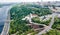 Aerial drone view of new pedestrian cycling park bridge construction, Dnieper river, hills, parks and Kyiv cityscape from above