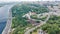 Aerial drone view of new pedestrian cycling park bridge construction, Dnieper river, hills, parks and Kyiv cityscape from above