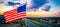 Aerial drone view next to Illuminated American Flag Flying over Modern Suburb