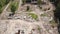 Aerial drone view of old demolished industrial building. Pile of concrete and brick rubbish, debris, rubble and waste of