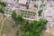 Aerial drone view of old demolished industrial building. Pile of concrete and brick rubbish, debris, rubble and waste of