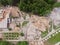 Aerial drone view of old demolished industrial building. Pile of concrete and brick rubbish, debris, rubble and waste of