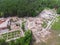 Aerial drone view of old demolished industrial building. Pile of concrete and brick rubbish, debris, rubble and waste of